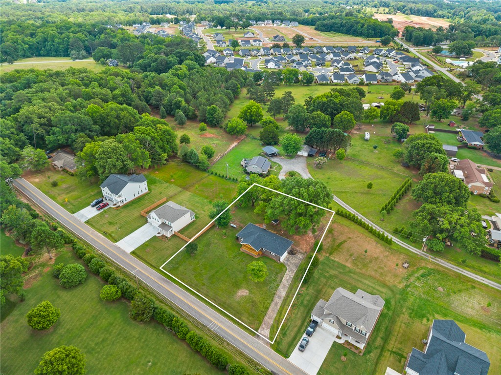 300 Vandiver Road Anderson, SC 29621 - Photo 27 of 30 An aerial perspective reveals a vast estate with abundant greenery and spacious surroundings.