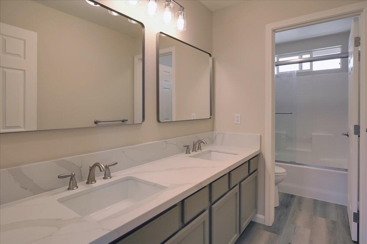 321 Alder Lane Buellton, CA 93427 - Photo 24 of 42 a bathroom with a sink and a mirror