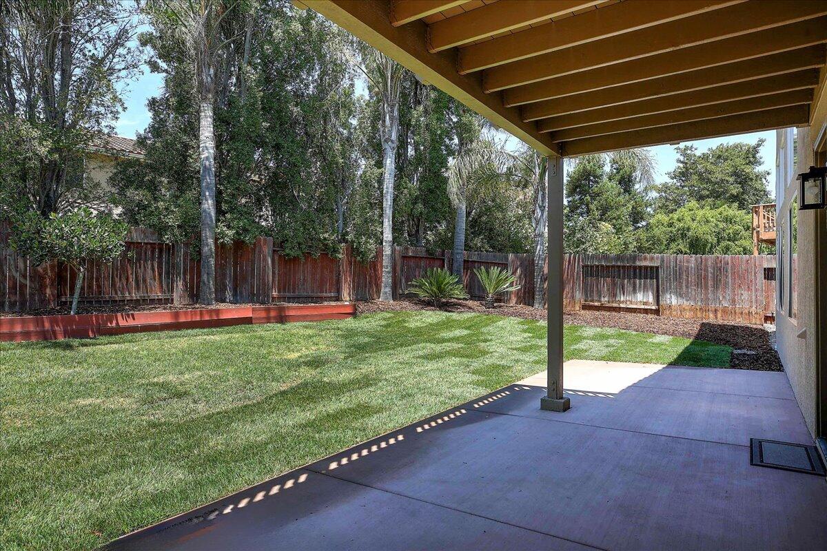 321 Alder Lane Buellton, CA 93427 - Photo 29 of 42 a backyard of a house with table and chairs