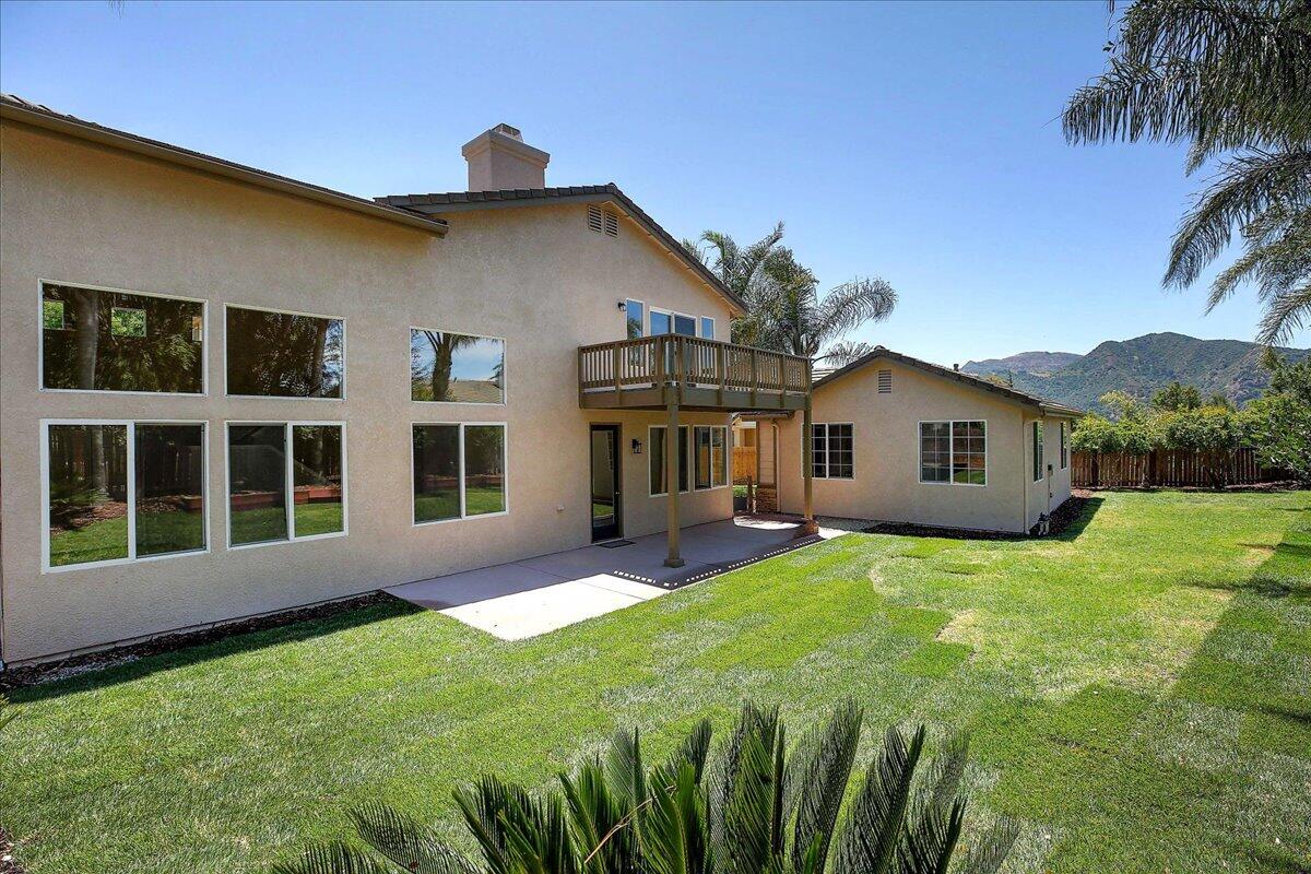 321 Alder Lane Buellton, CA 93427 - Photo 30 of 42 a view of a house with a yard and potted plants
