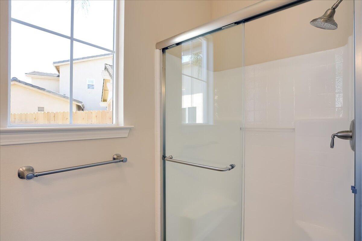 321 Alder Lane Buellton, CA 93427 - Photo 39 of 42 a bathroom with a shower and a window
