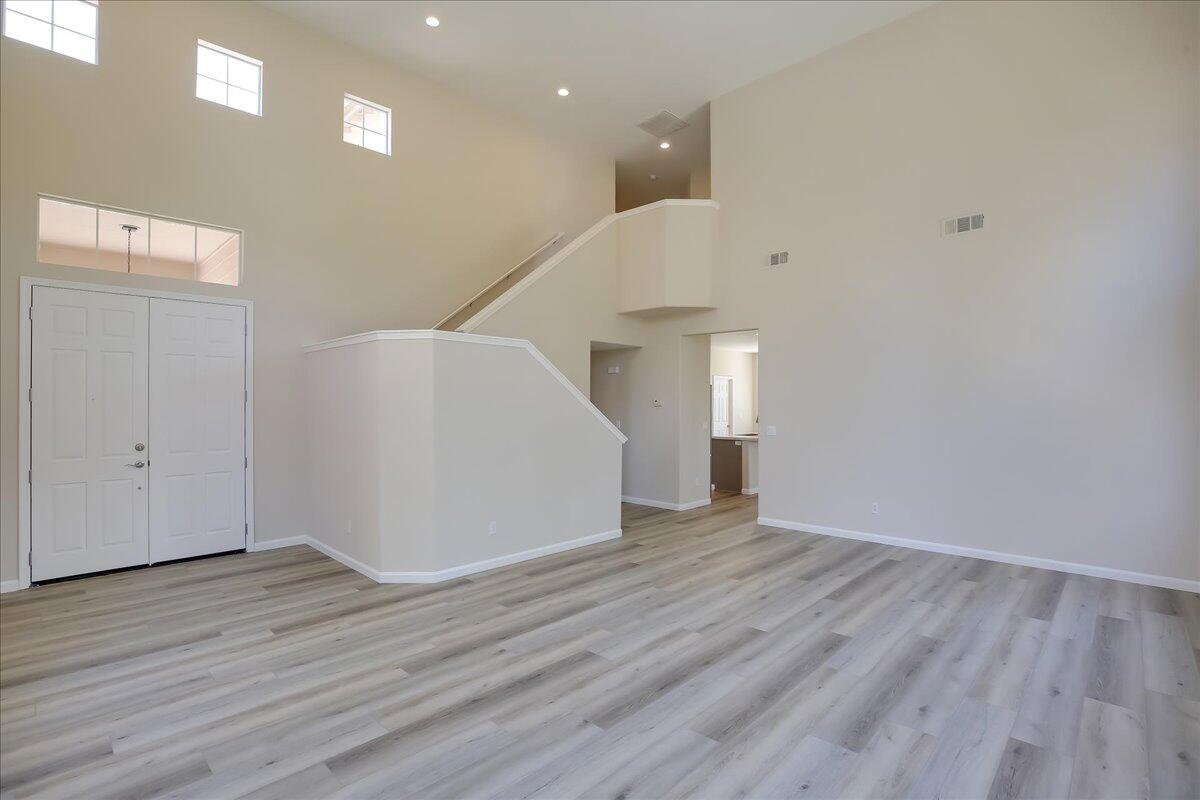 321 Alder Lane Buellton, CA 93427 - Photo 4 of 42 a view of an empty room with wooden floor