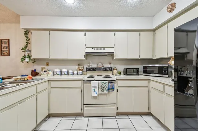 $232,000 | 23227 Club Villas Drive, Unit 38, Land O' Lakes, FL 34639