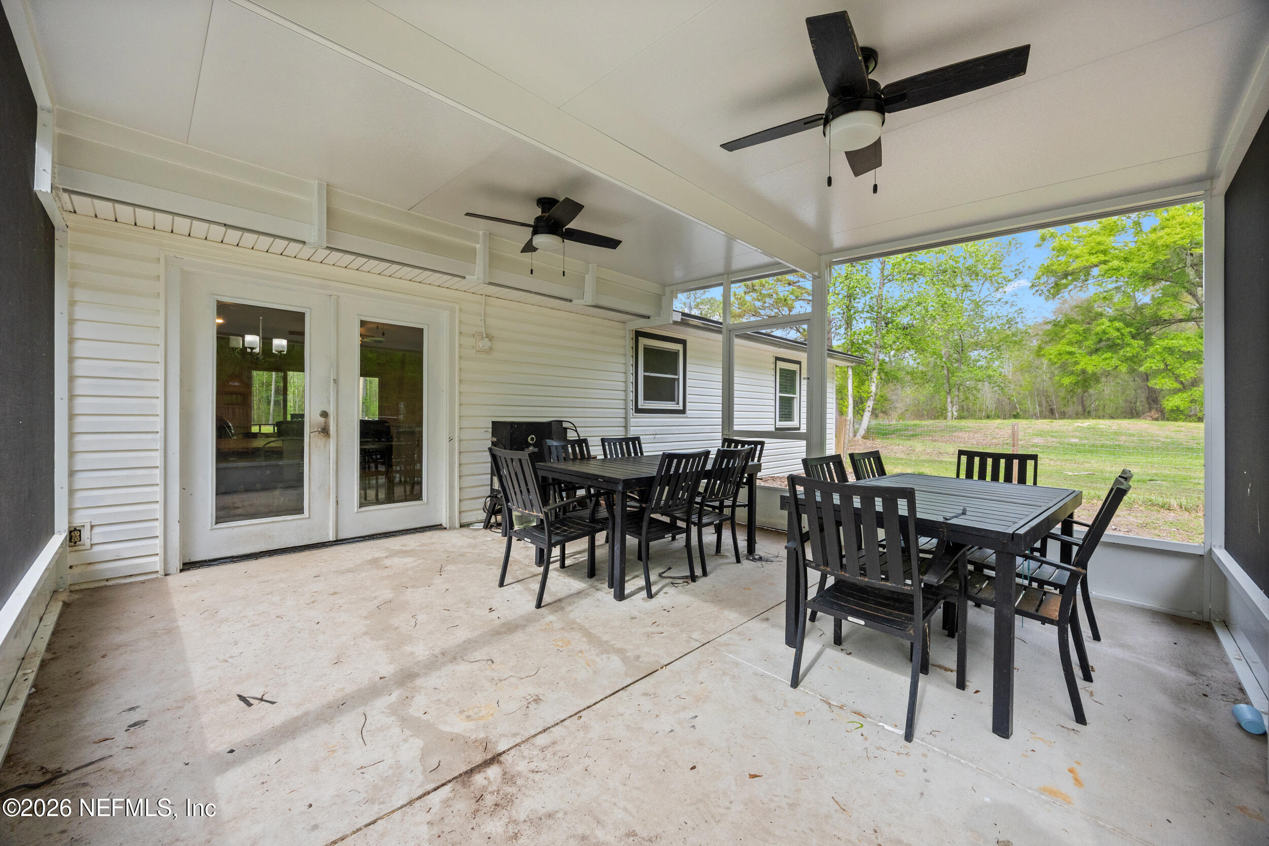 2030 Wayfare Lane Middleburg, FL 32068 - Photo 23 of 46 a view of a dining room with furniture window and outside view