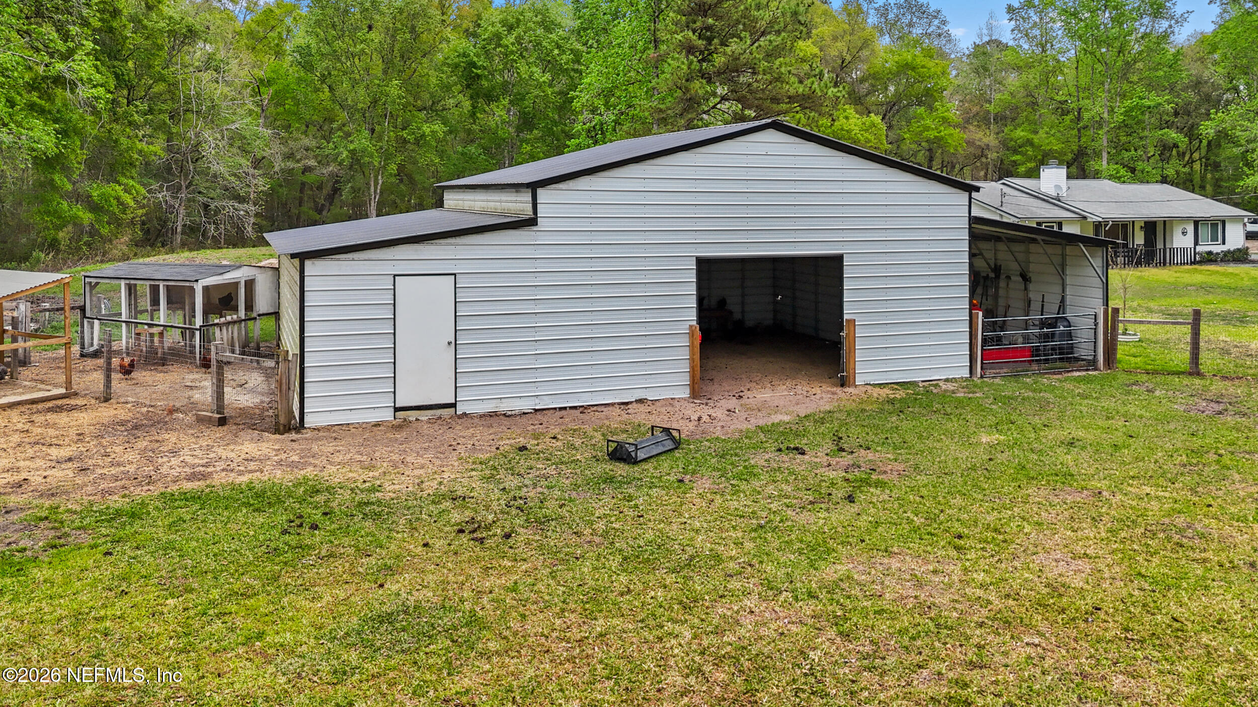2030 Wayfare Lane Middleburg, FL 32068 - Photo 29 of 46 a view of a house with a yard and garage