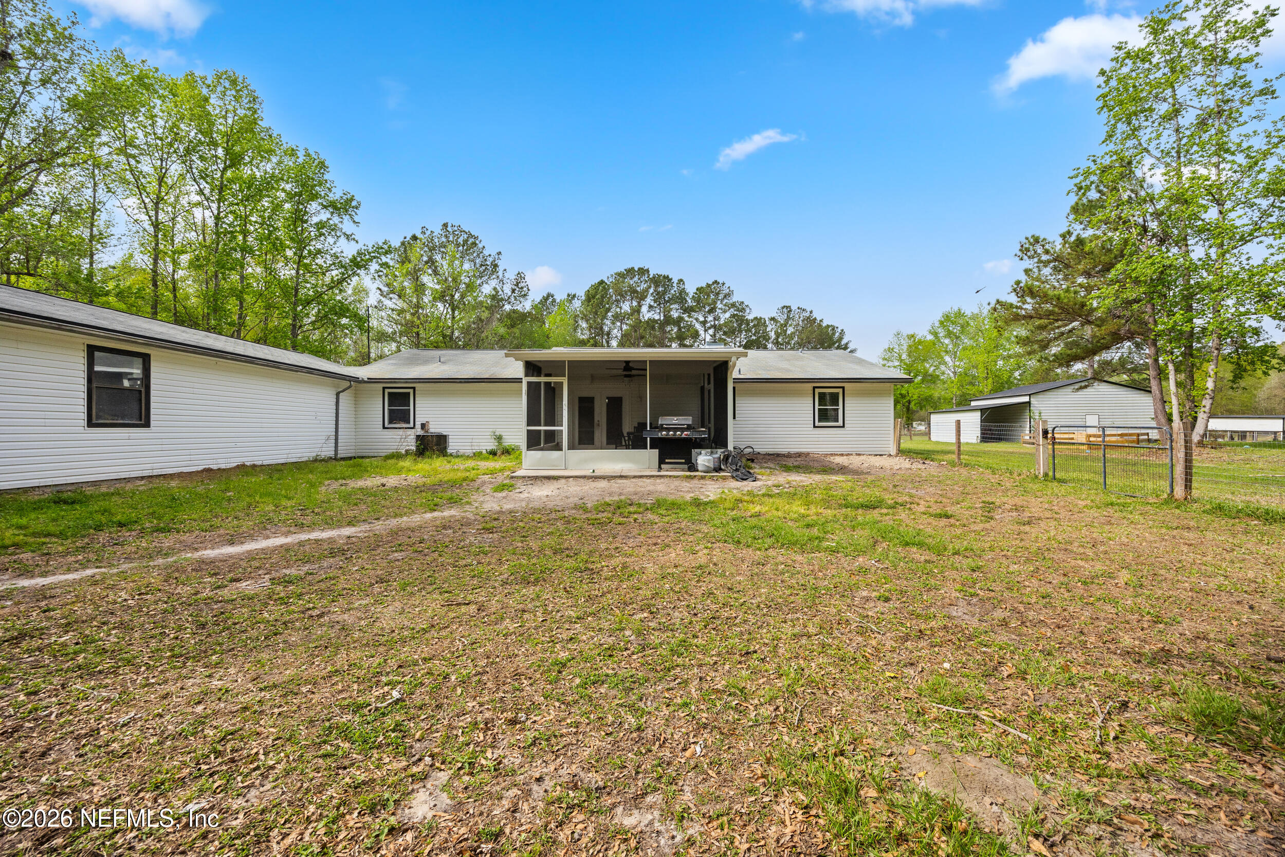 2030 Wayfare Lane Middleburg, FL 32068 - Photo 33 of 46 a front view of house with yard and trees
