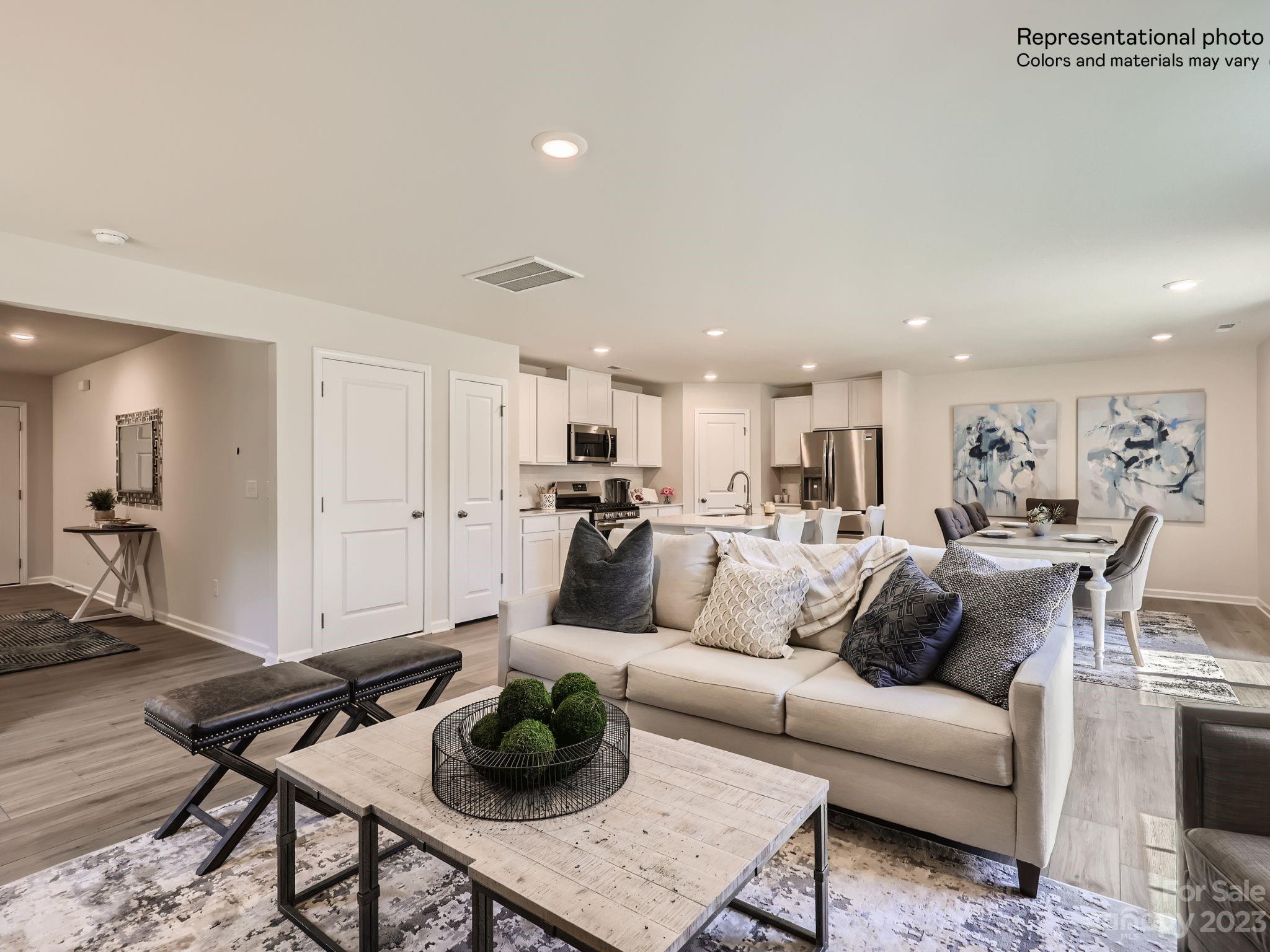 2775 Legacy Rdg Lane, Unit 112 Catawba, NC 28609 - Photo 4 of 12 a living room with furniture kitchen view and a table