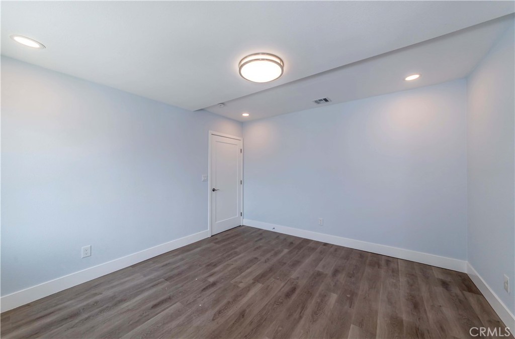 4569 Whitney Drive El Monte, CA 91731 - Photo 14 of 41 wooden floor in an empty room