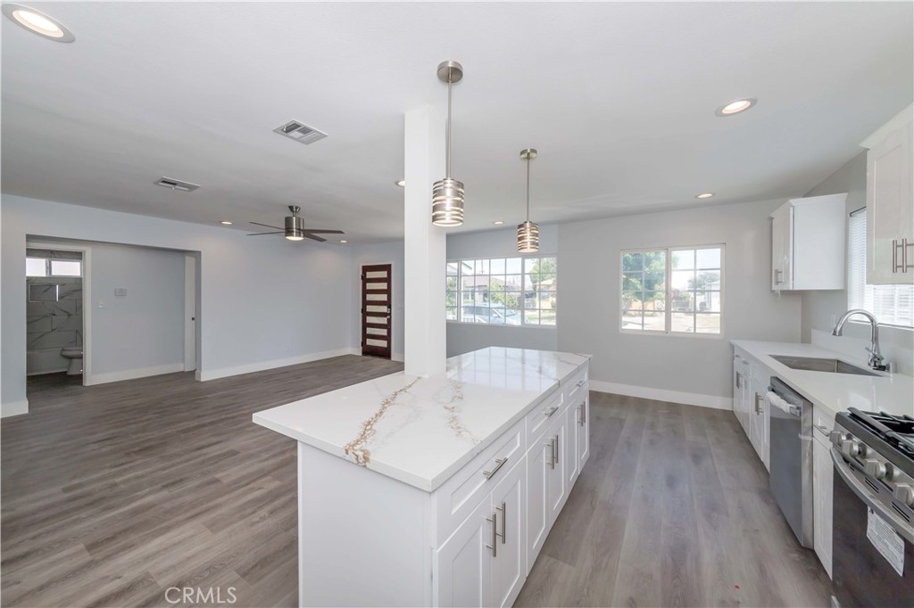 4569 Whitney Drive El Monte, CA 91731 - Photo 20 of 41 a kitchen with sink and wooden floor