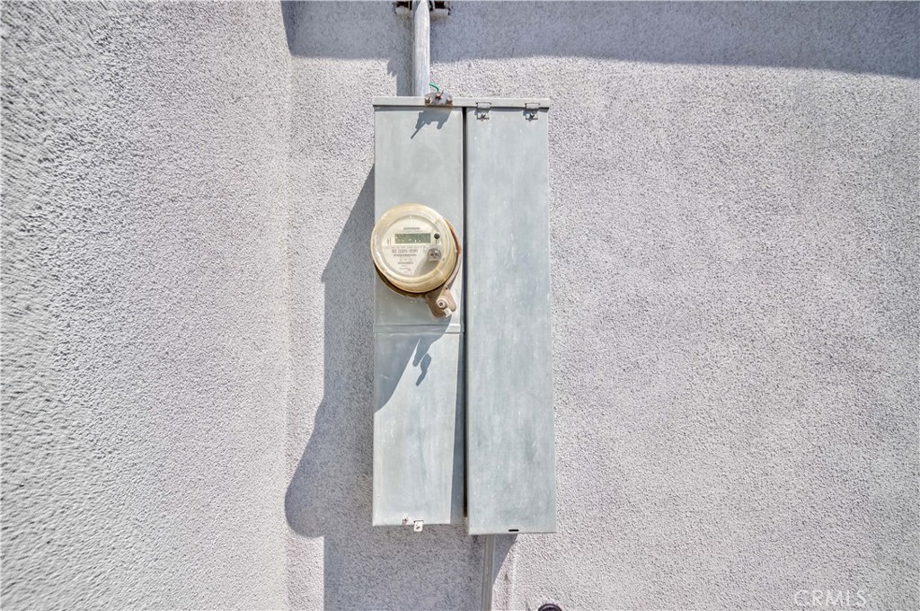 4569 Whitney Drive El Monte, CA 91731 - Photo 33 of 41 a wall with a clock on it