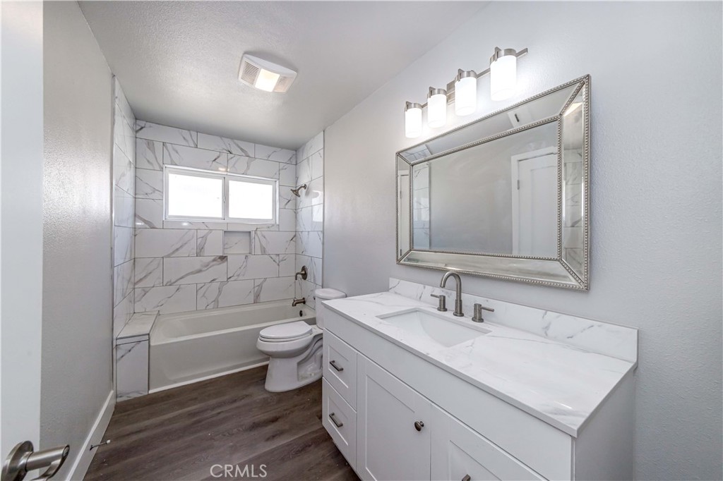 4569 Whitney Drive El Monte, CA 91731 - Photo 10 of 41 a bathroom with a double vanity sink toilet and shower