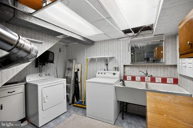 a utility room with dryer and washer