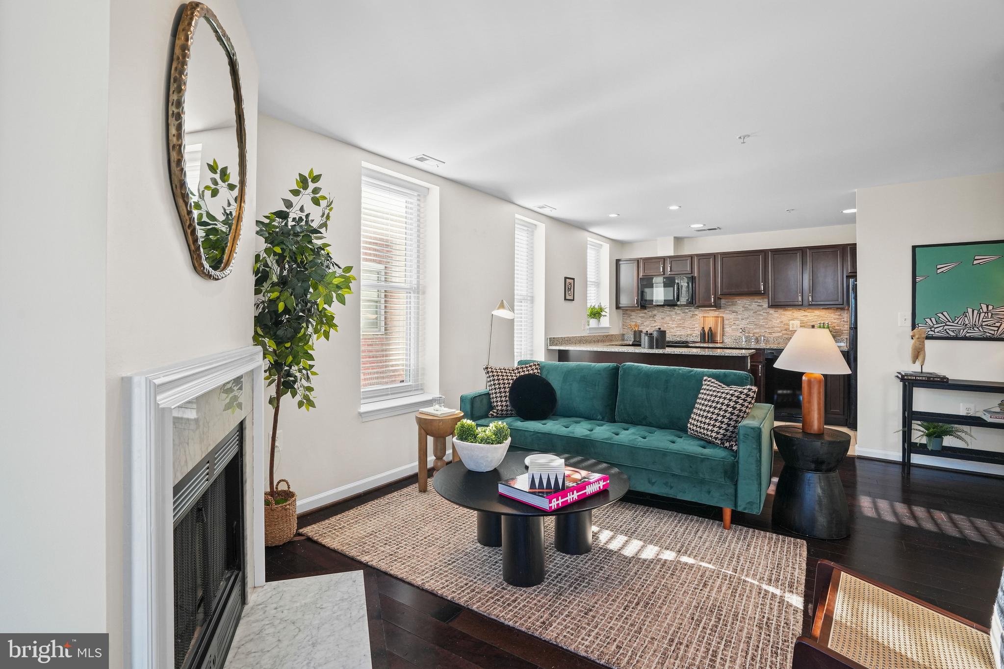 Living area with charming decorative fireplace