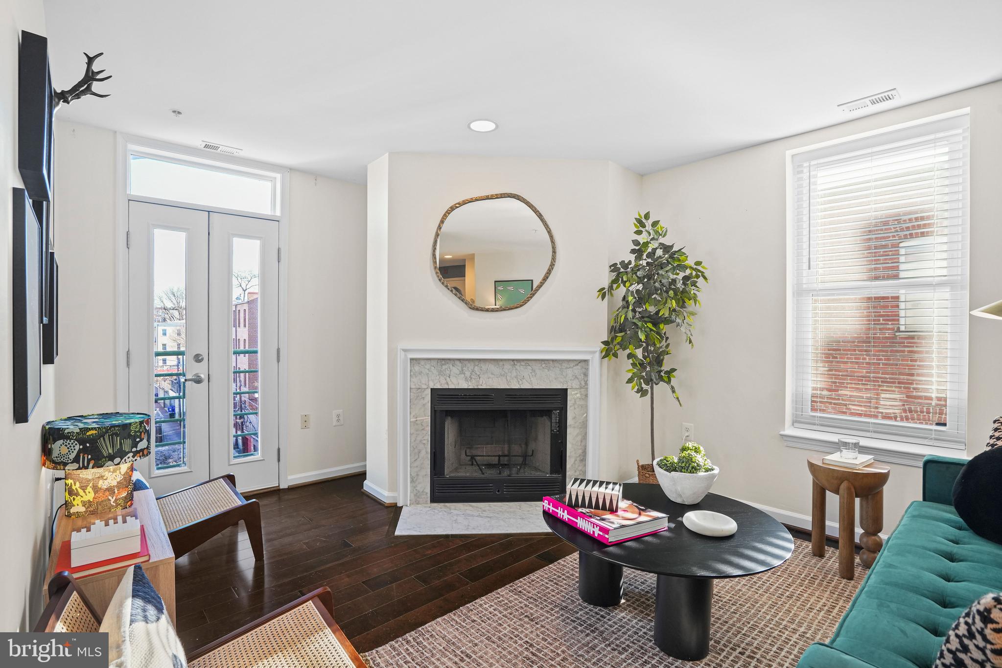 2627 Adams Mill Road Northwest, Unit 402 Washington, DC 20009 - Photo 12 of 17 Living area with juliet balcony