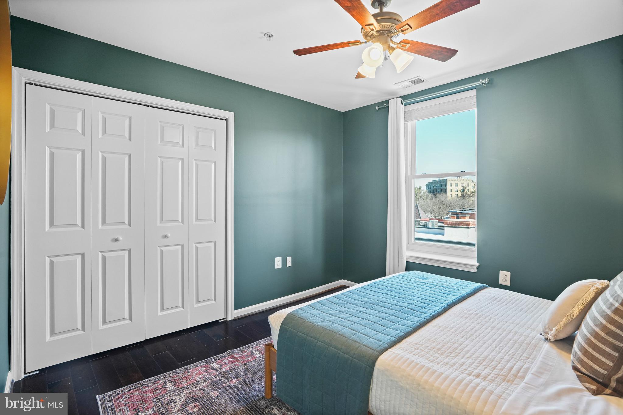 2627 Adams Mill Road Northwest, Unit 402 Washington, DC 20009 - Photo 13 of 17 Cozy bedroom with ample closet space
