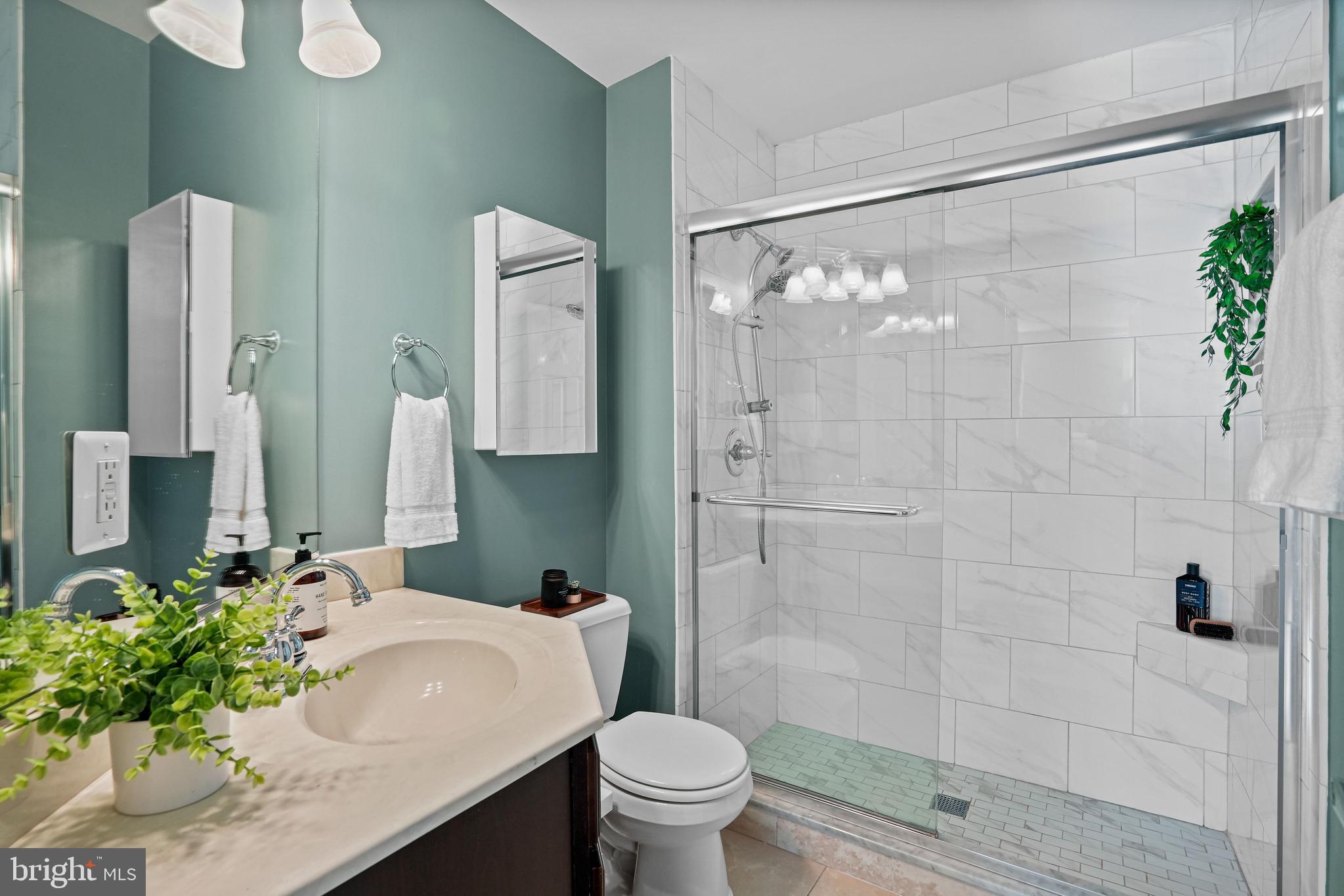 2627 Adams Mill Road Northwest, Unit 402 Washington, DC 20009 - Photo 15 of 17 Well-appointed bathroom with practical layout