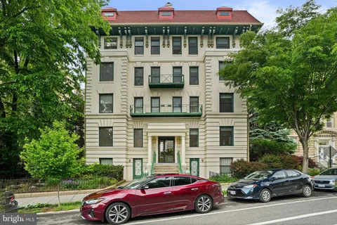 a car parked in front of a building