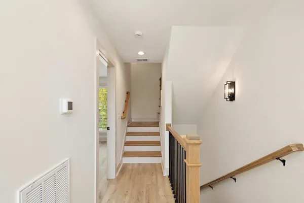 a view of entryway with wooden floor