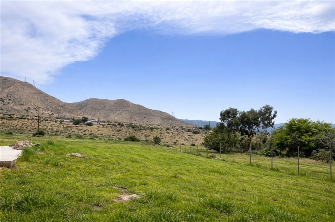 20485 Piedmont Road Apple Valley, CA 92308 - Photo 3 of 9 a view of an outdoor space and a yard