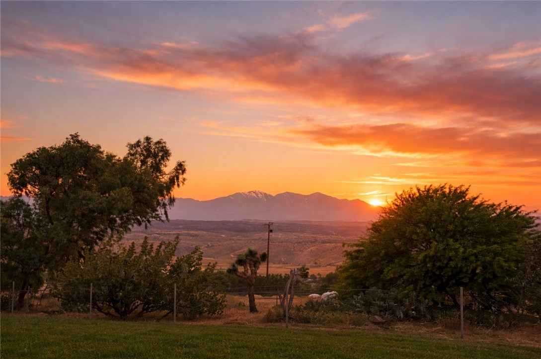 20485 Piedmont Road Apple Valley, CA 92308 - Photo 5 of 9 a view of a town with mountains in the background