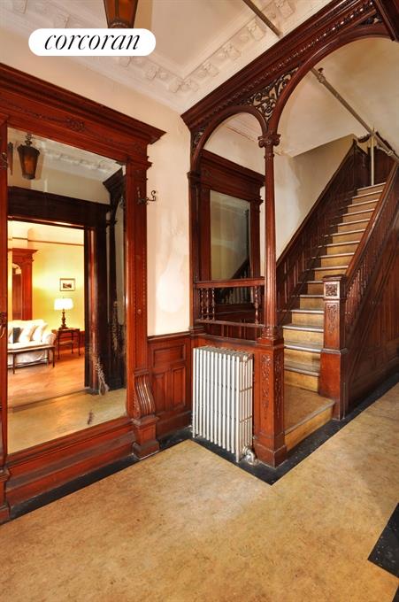 970 Park Place Brooklyn, NY 11213 - Photo 1 of 1 a view of a porch with a door and wooden floor