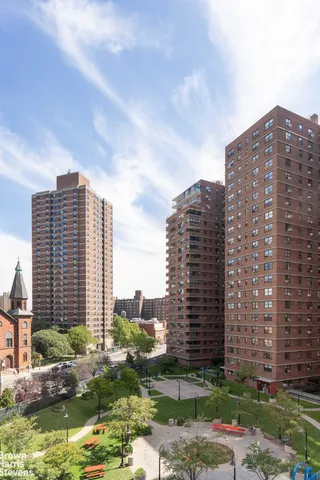 a view of a city with tall buildings