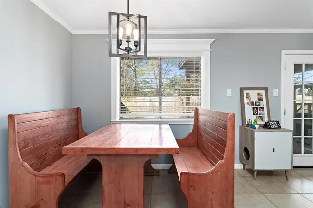 a view of a livingroom with furniture and window