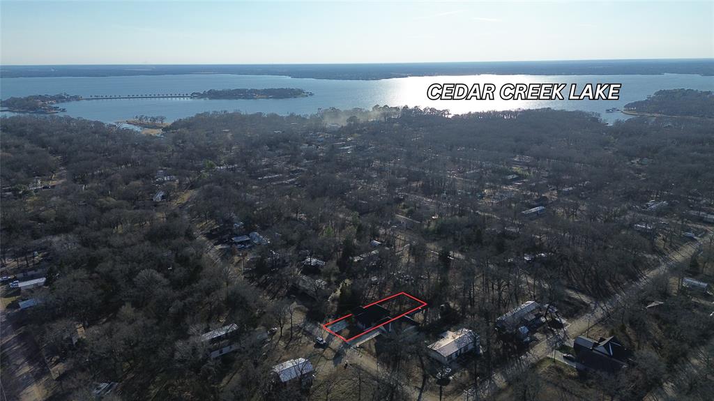 106 Ute Trail Mabank, TX 75156 - Photo 26 of 28 Aerial view of property and surrounding area featuring property parcel outlined and a large body of water