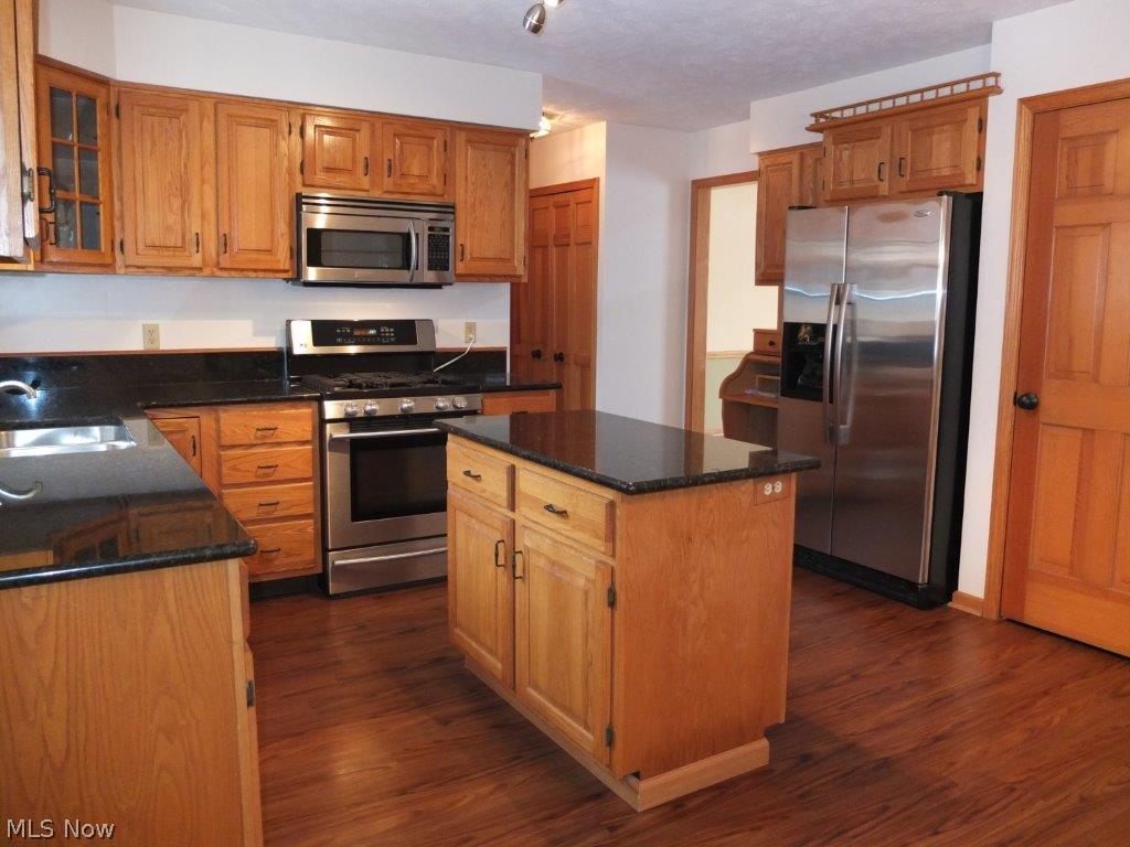 6301 Andalor Street Northwest Canton, OH 44708 - Photo 5 of 24 Fully applianced kitchen with pantry and built in desk.