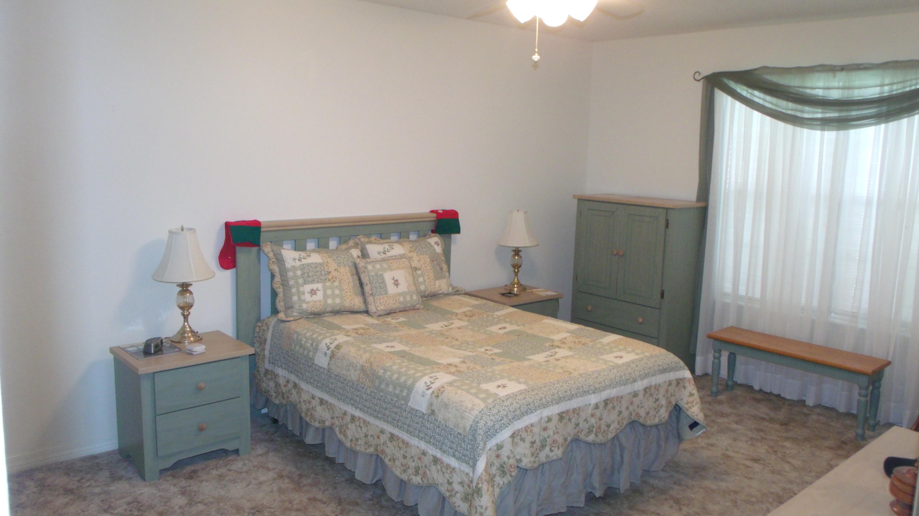 5918 Jack Stokes Road Baker, FL 32531 - Photo 17 of 23 a bedroom with a bed and a window