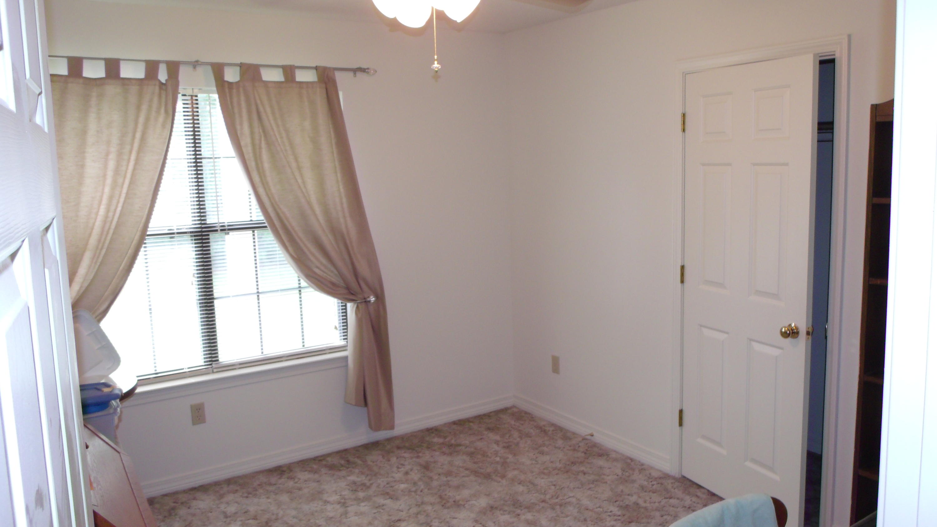 5918 Jack Stokes Road Baker, FL 32531 - Photo 19 of 23 a view of an empty room and window