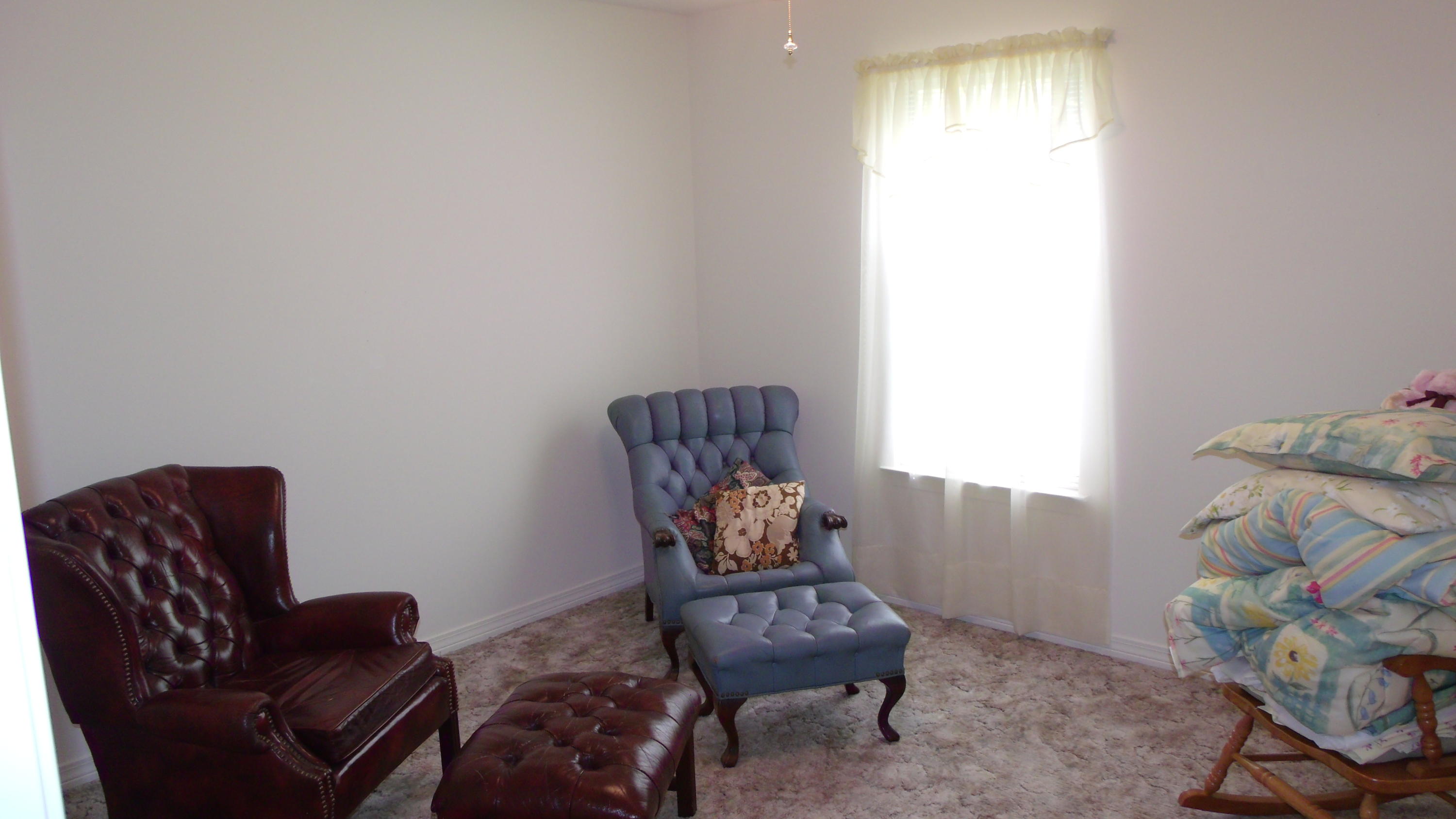 5918 Jack Stokes Road Baker, FL 32531 - Photo 20 of 23 a living room with furniture and a window