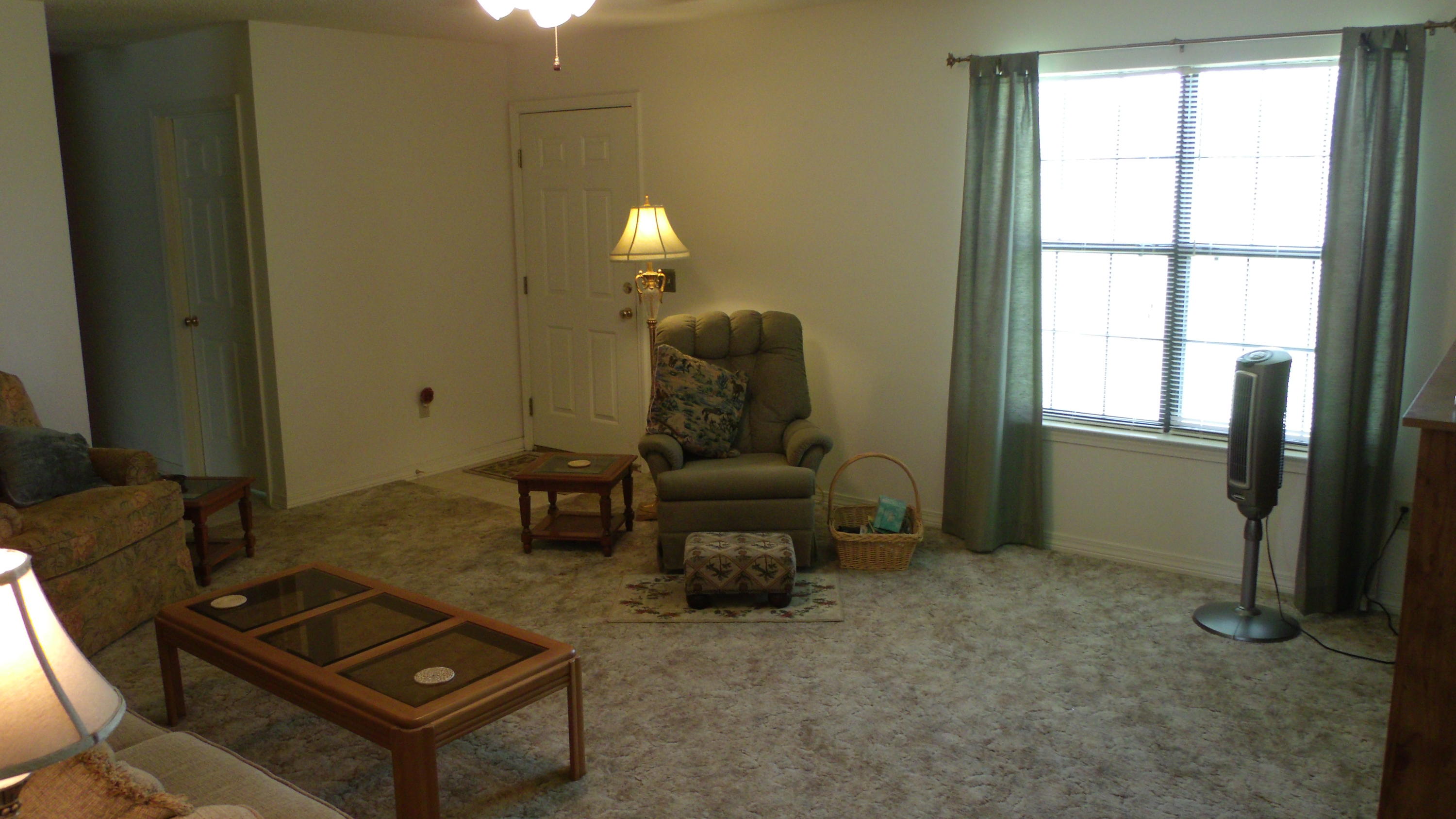 5918 Jack Stokes Road Baker, FL 32531 - Photo 21 of 23 a living room with furniture and a window