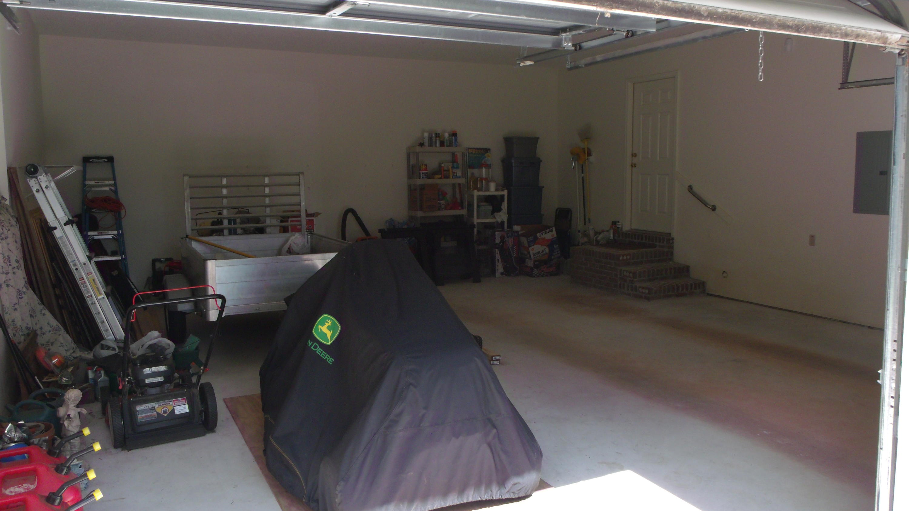 5918 Jack Stokes Road Baker, FL 32531 - Photo 23 of 23 a living room with furniture and a flat screen tv
