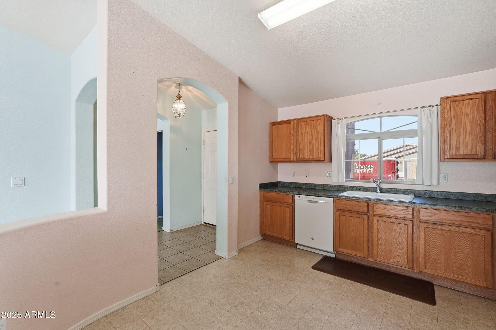 2101 South Meridian Road, Unit 354 Apache Junction, AZ 85120 - Photo 12 of 50 a hall with a sink and a mirror