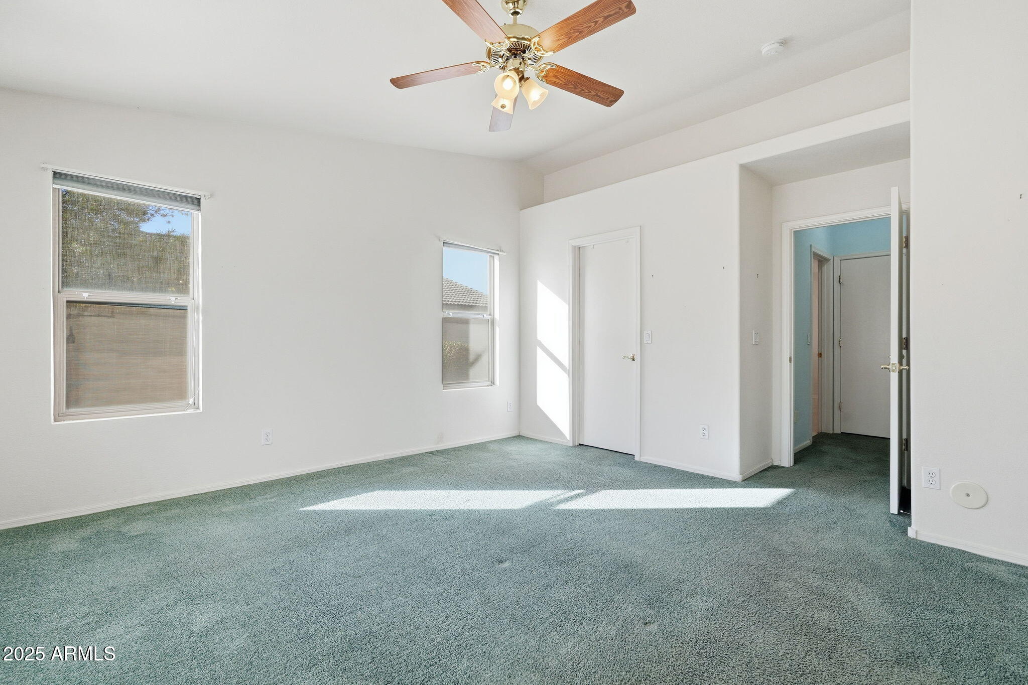 2101 South Meridian Road, Unit 354 Apache Junction, AZ 85120 - Photo 19 of 50 a view of an empty room with a window