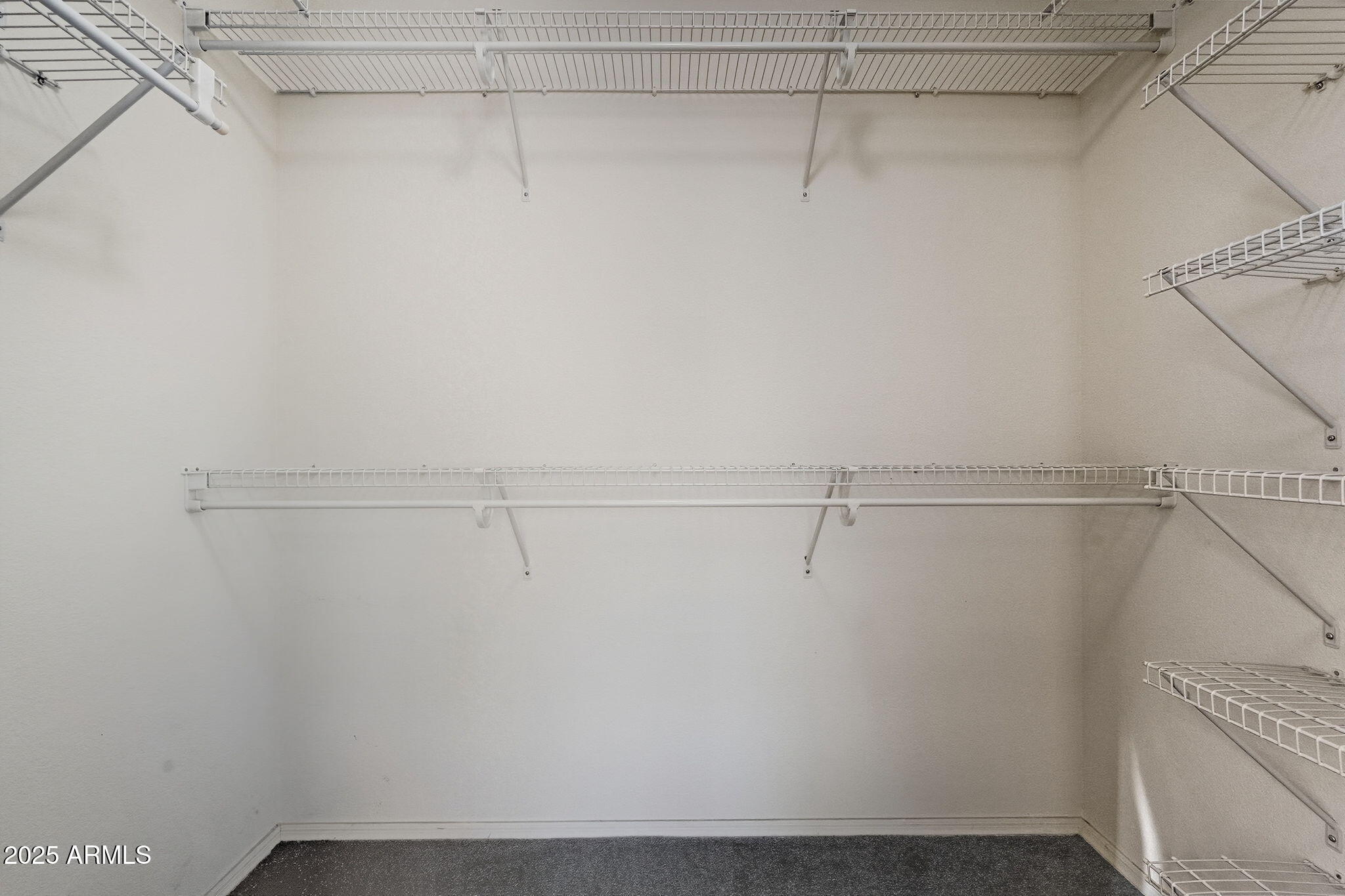 2101 South Meridian Road, Unit 354 Apache Junction, AZ 85120 - Photo 22 of 50 a view of a room with racks on the wall