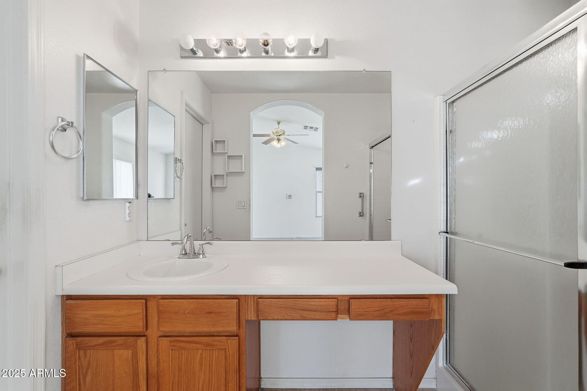 2101 South Meridian Road, Unit 354 Apache Junction, AZ 85120 - Photo 25 of 50 a bathroom with a sink and a mirror