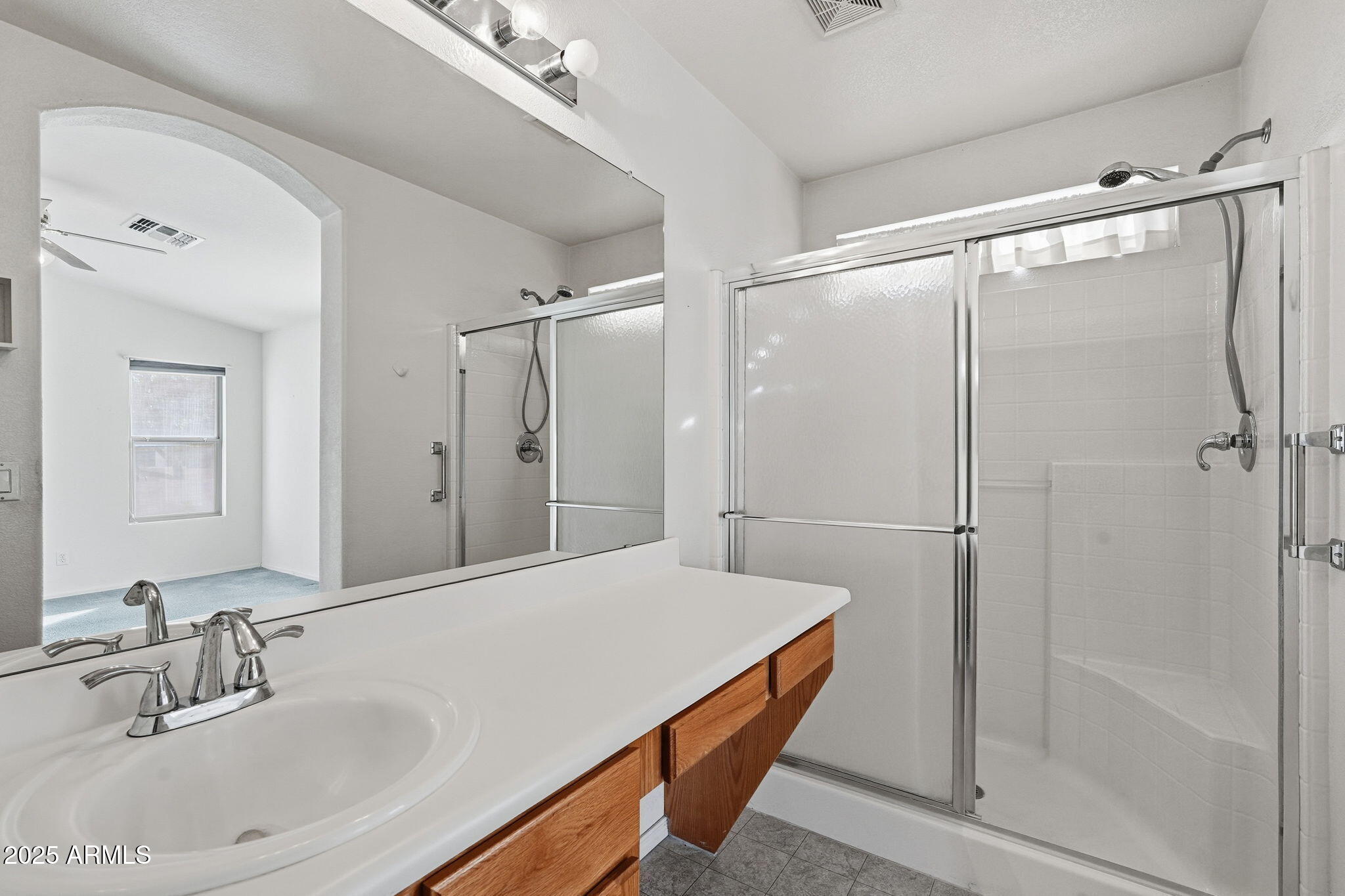 2101 South Meridian Road, Unit 354 Apache Junction, AZ 85120 - Photo 26 of 50 a bathroom with a sink and a mirror