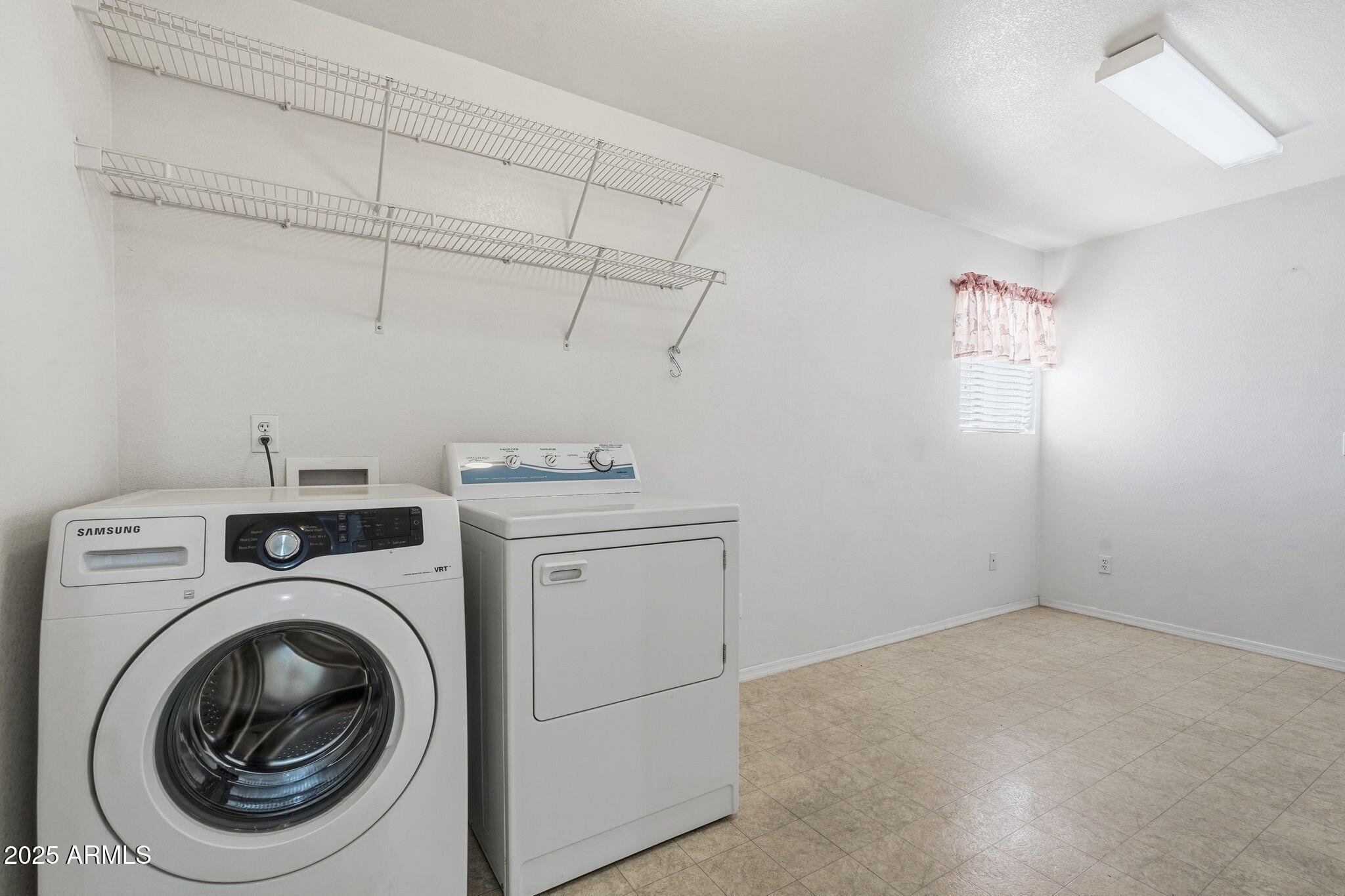 2101 South Meridian Road, Unit 354 Apache Junction, AZ 85120 - Photo 29 of 50 a utility room with dryer and washer