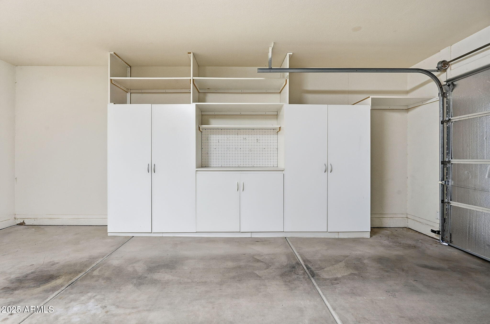2101 South Meridian Road, Unit 354 Apache Junction, AZ 85120 - Photo 32 of 50 a view of walk in closet with empty racks
