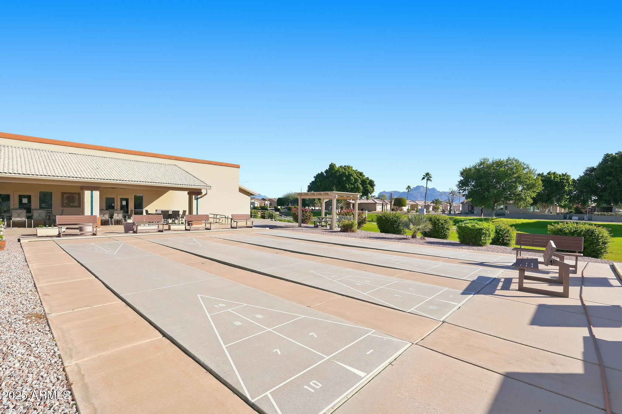 2101 South Meridian Road, Unit 354 Apache Junction, AZ 85120 - Photo 40 of 50 a view of a terrace with chairs and potted plants