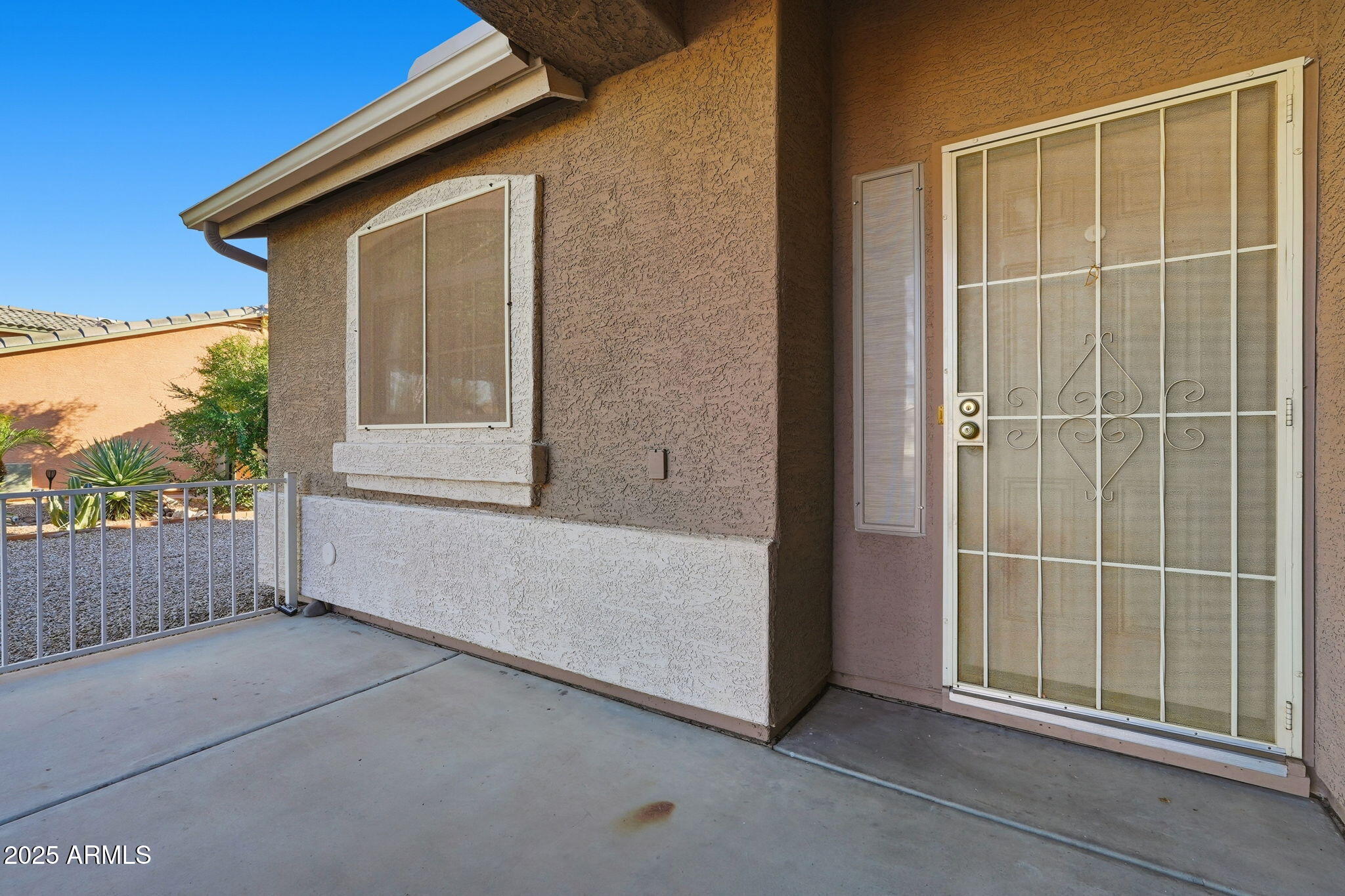 2101 South Meridian Road, Unit 354 Apache Junction, AZ 85120 - Photo 4 of 50 a view of outdoor space with wooden fence