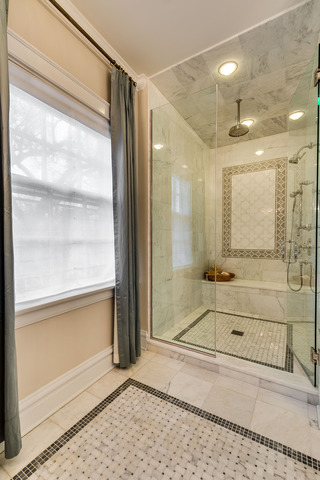 1005 Sheridan Road Evanston, IL 60202 - Photo 15 of 25 a bathroom with a glass shower door and a glass door shower