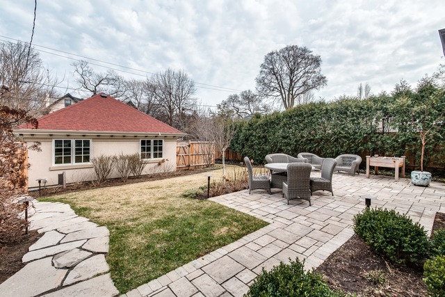 1005 Sheridan Road Evanston, IL 60202 - Photo 25 of 25 a view of a patio with a table and chairs under an umbrella