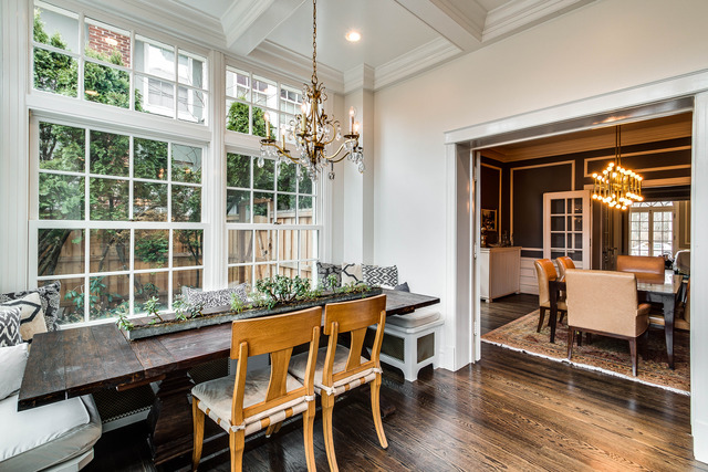 1005 Sheridan Road Evanston, IL 60202 - Photo 8 of 25 a dining room with wooden floor a chandelier a glass table and chairs