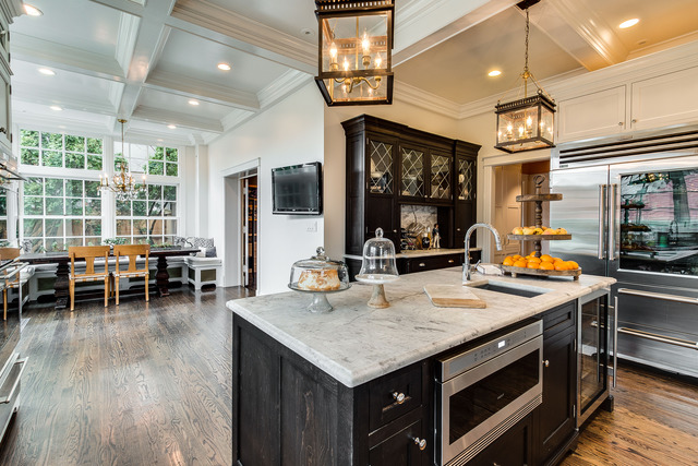 1005 Sheridan Road Evanston, IL 60202 - Photo 9 of 25 a kitchen with stainless steel appliances granite countertop a stove and a wooden floors