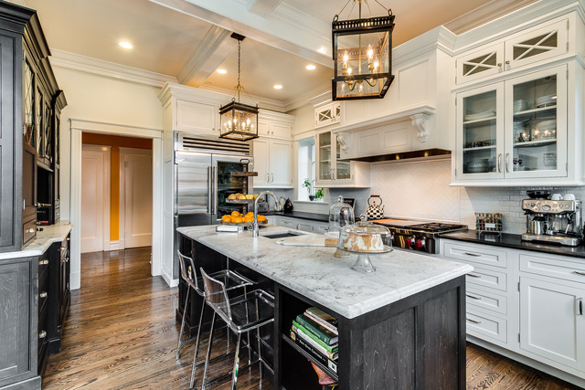 1005 Sheridan Road Evanston, IL 60202 - Photo 10 of 25 a kitchen with stainless steel appliances granite countertop a stove a refrigerator a sink dishwasher a dining table and chairs with wooden floor