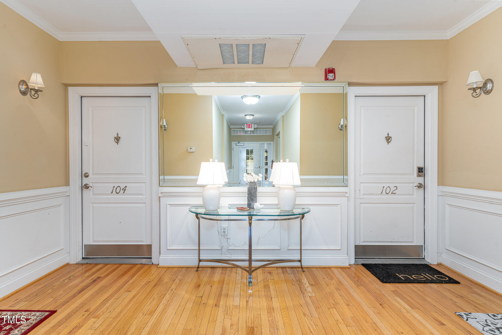 7510 Lead Mine Road, Unit 104 Raleigh, NC 27615 - Photo 2 of 23 Step our of elevator and you are just steps from your entrance to Unit 104