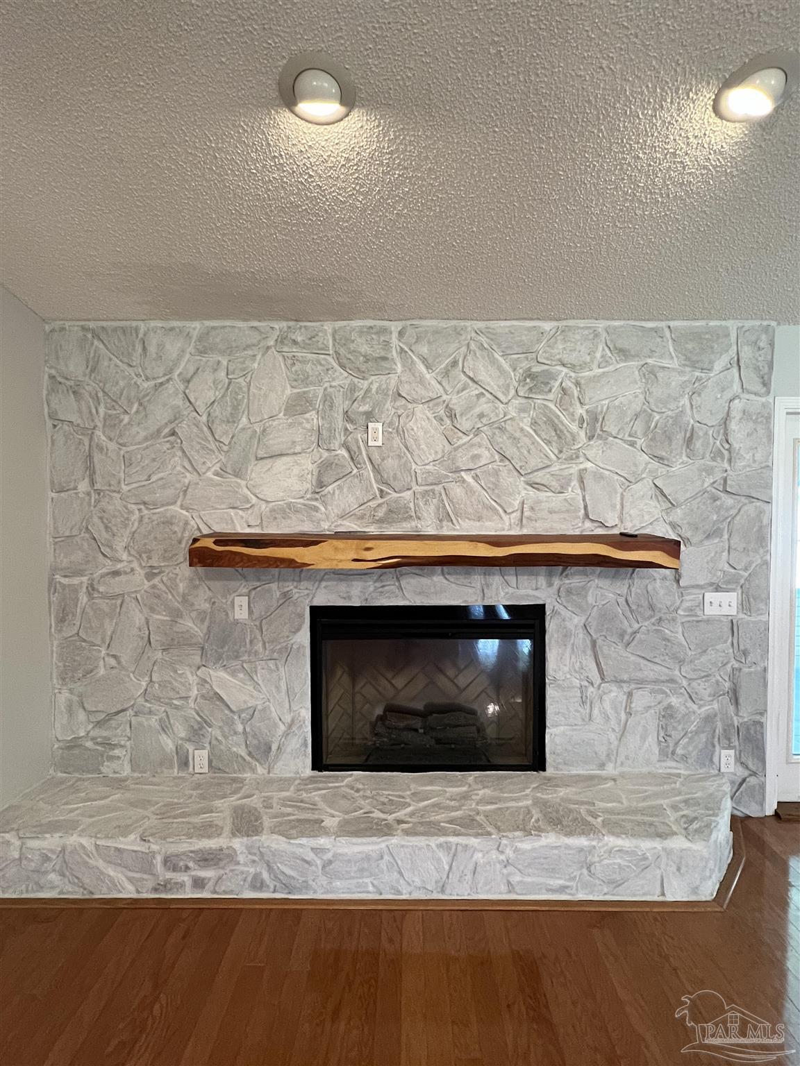 3143 Aarons Way Pace, FL 32571 - Photo 11 of 38 a room has a stove and a microwave